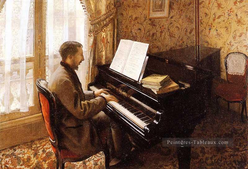 Jeune homme jouant du piano Gustave Caillebotte Peintures à l'huile